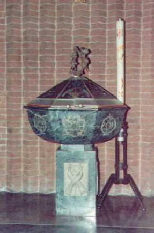 Il coperchio del fonte battesimale